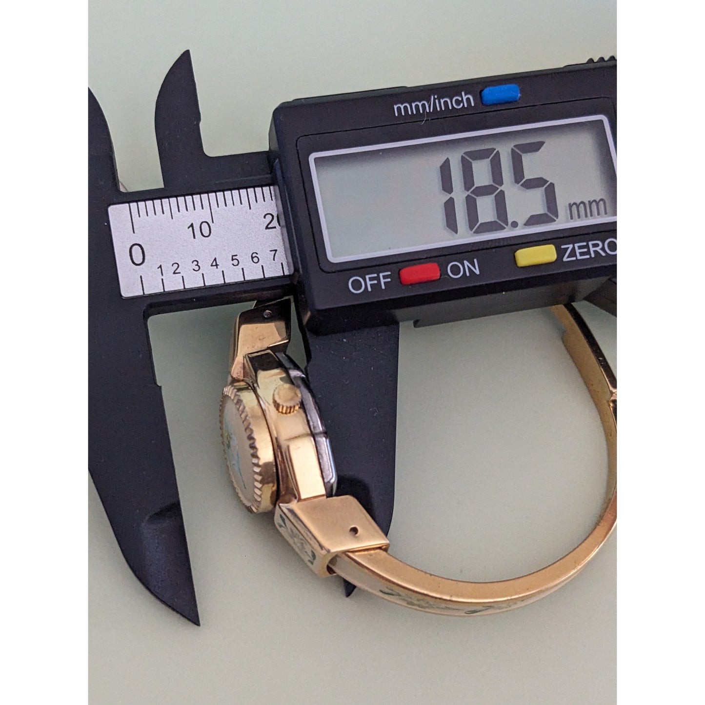 Vintage Itraco Gold Tone Bangle Concealed Dial Watch Beige Enamel Floral Design