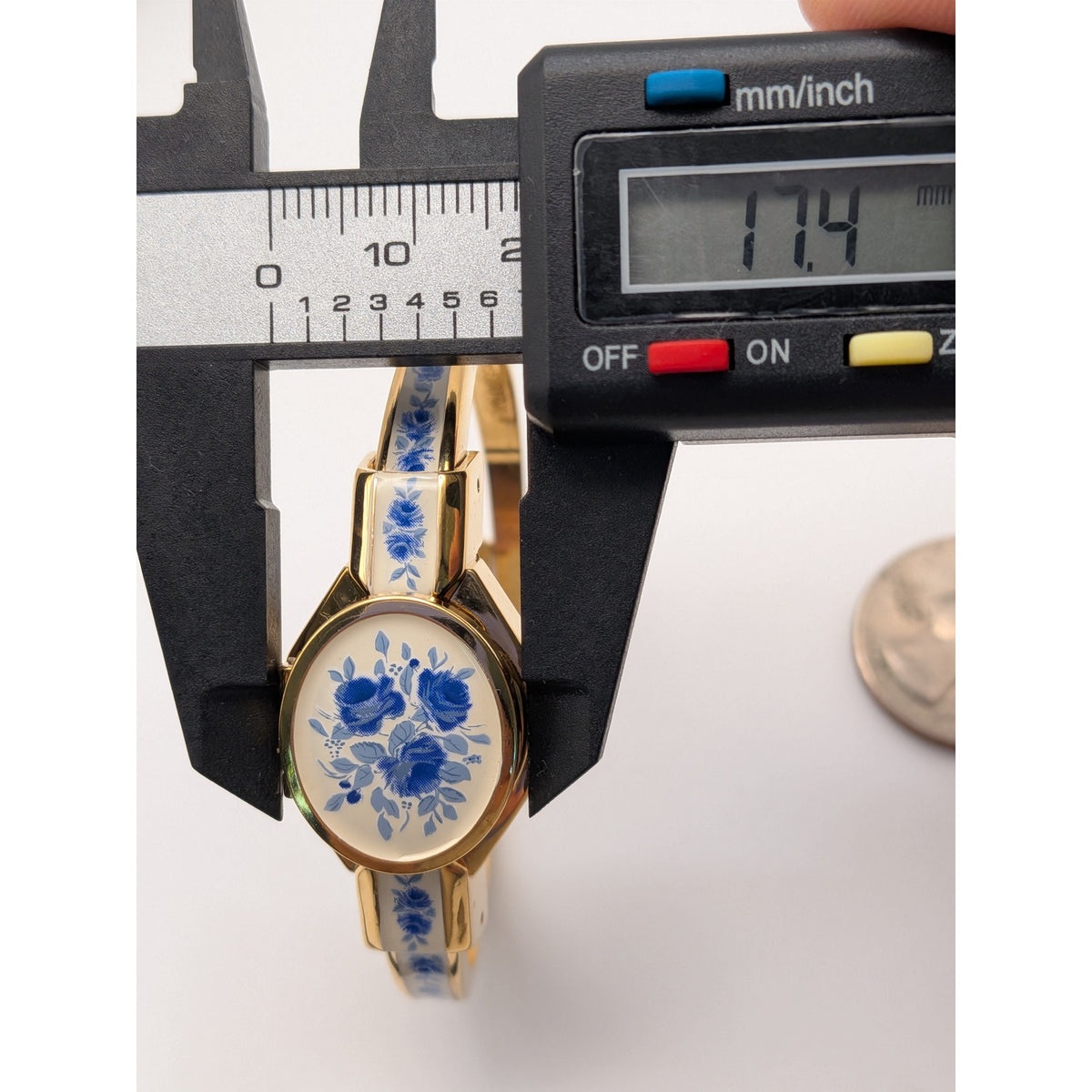 Preowned Andre Mouche Gold Tone Peekaboo Watch White Enamel Blue Flowers