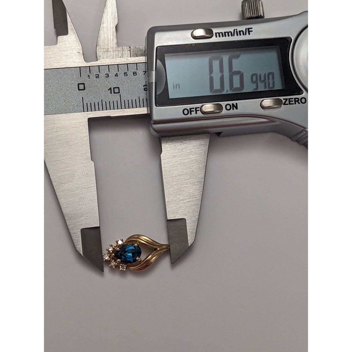 Vintage Unmarked 14k Yellow Gold Blue Topaz Diamond Accent Pendant