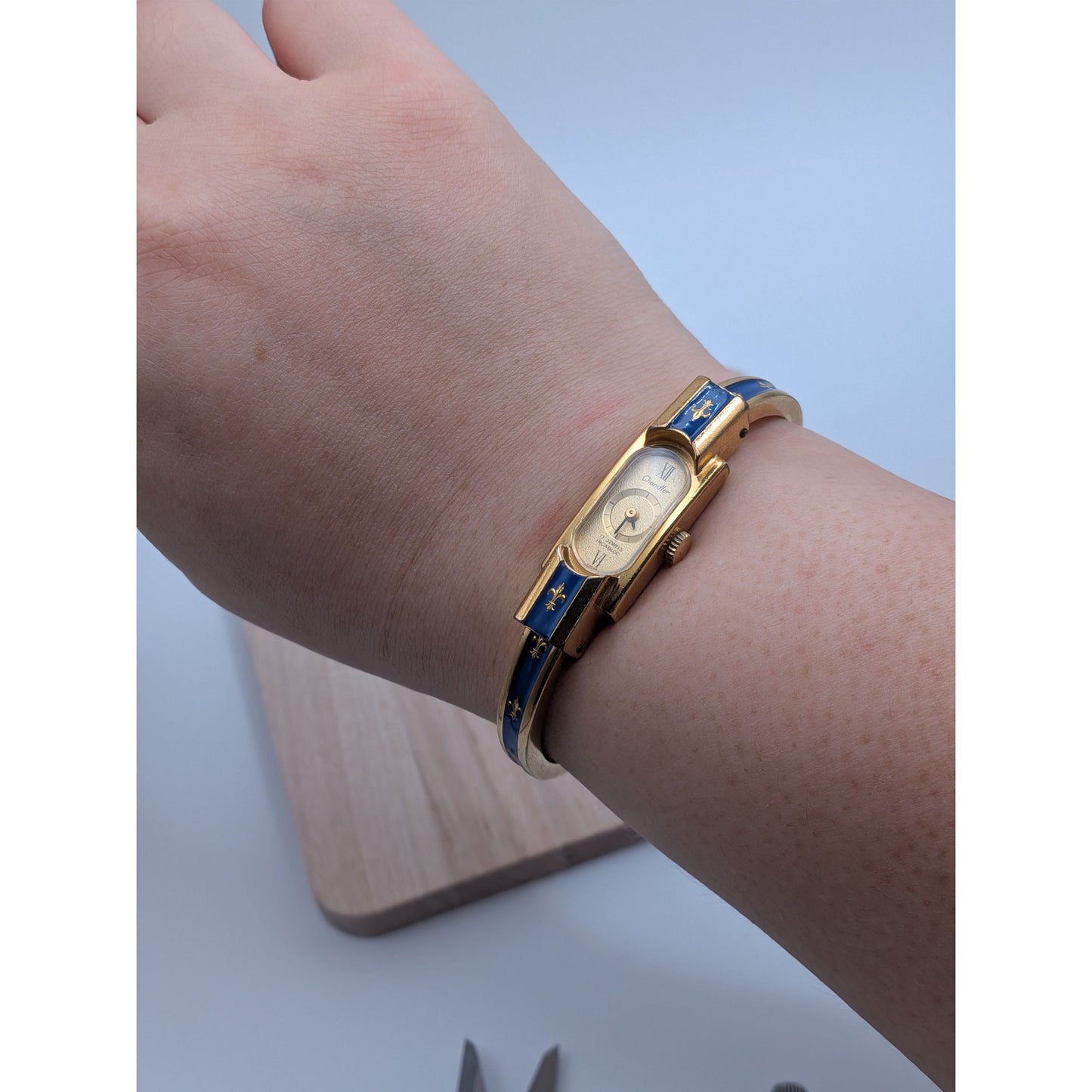 Vintage Chandler Gold Tone Manual Watch Blue Enamel Fleur De Lis Accents