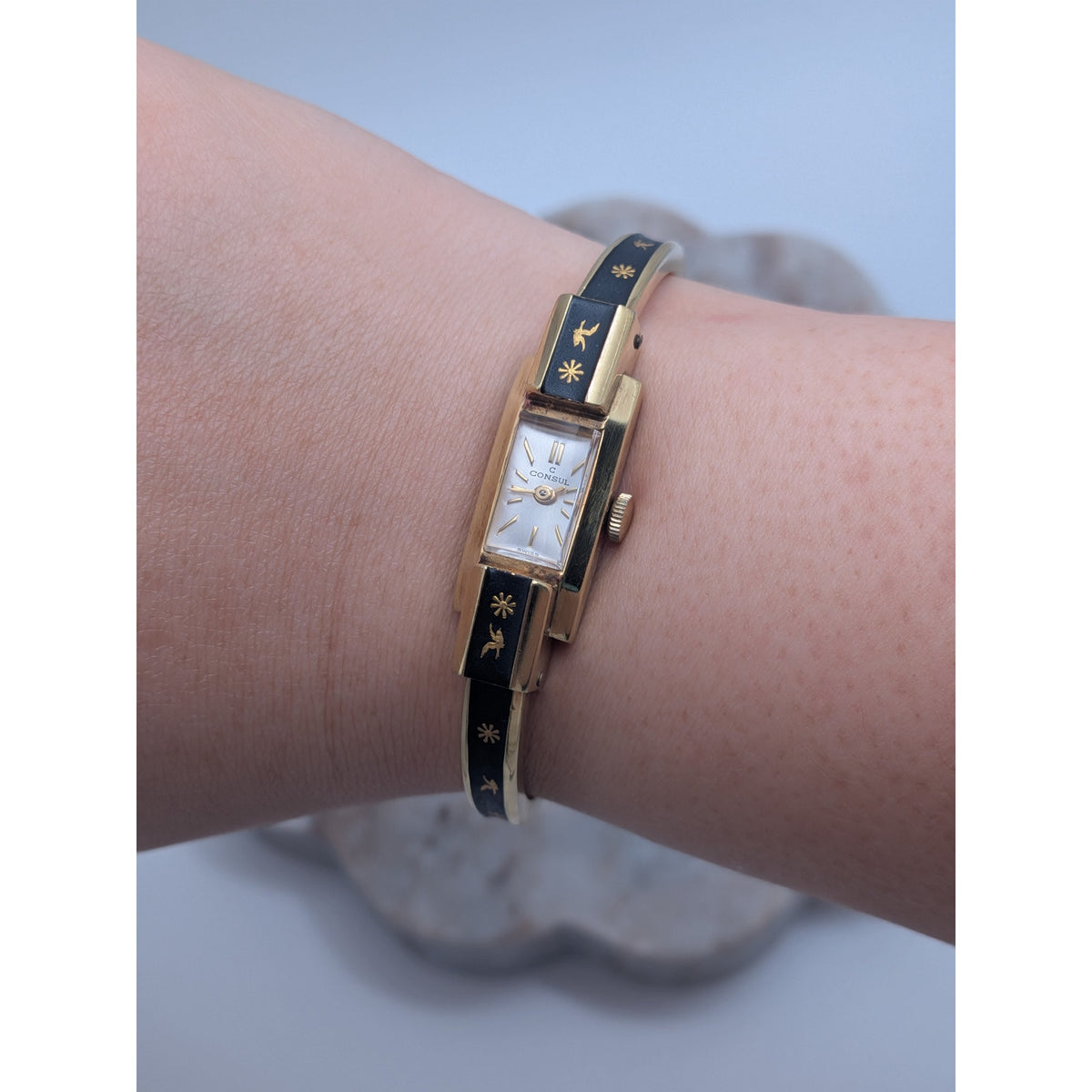 Vintage Consul Gold Tone Watch Matte Black Enamel Bird and Flower Accents