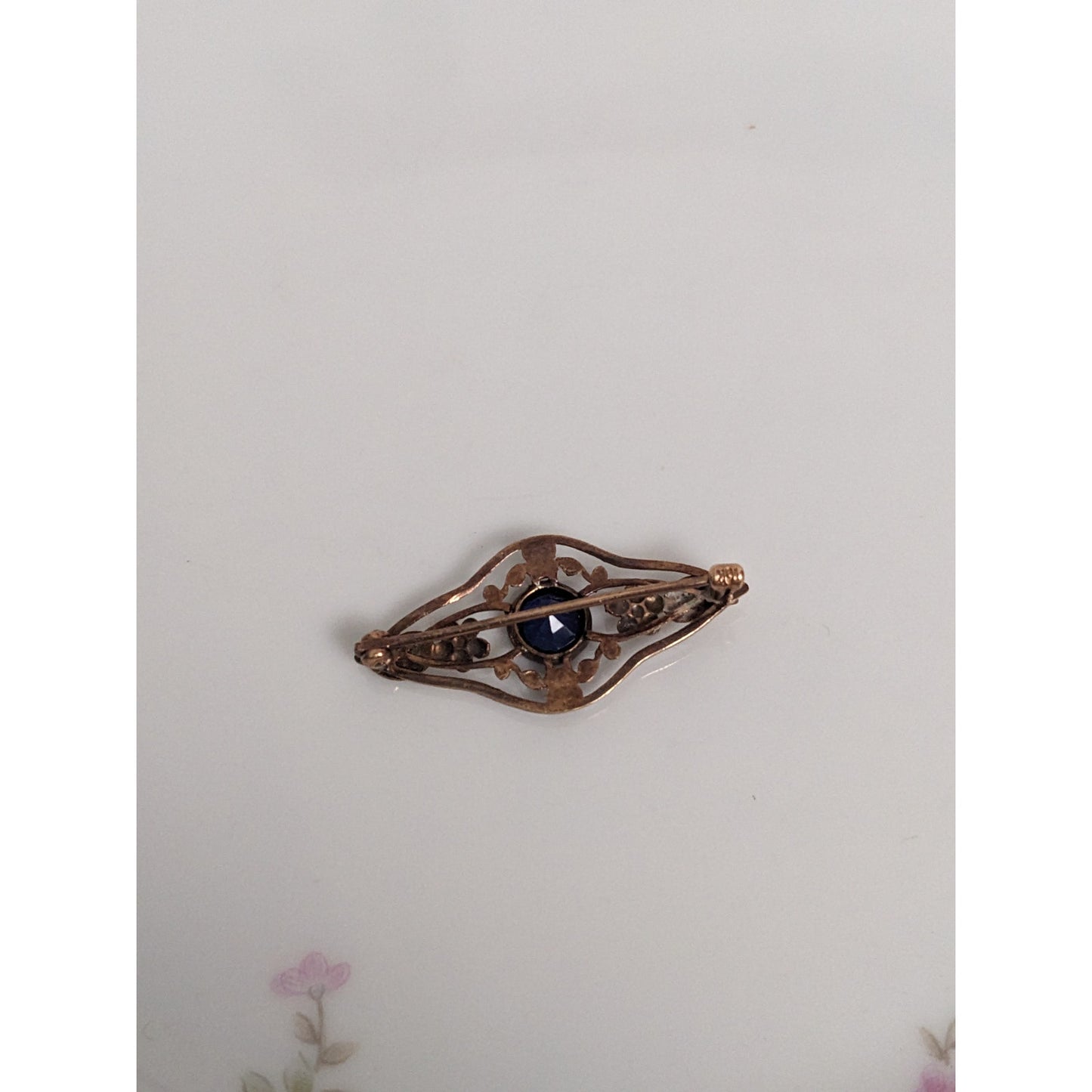 Antique 10k Rose and Yellow Gold Floral Brooch with Blue Gem