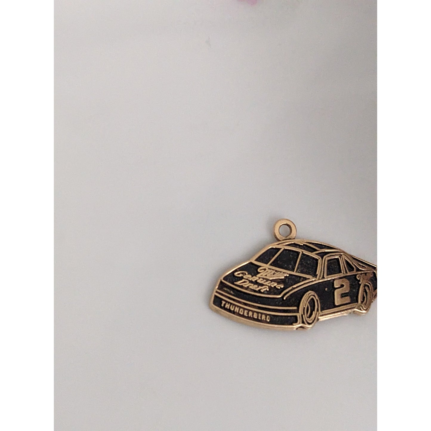 Estate 14k Yellow Gold with Black Enamel Nascar Thunderbird Pendant