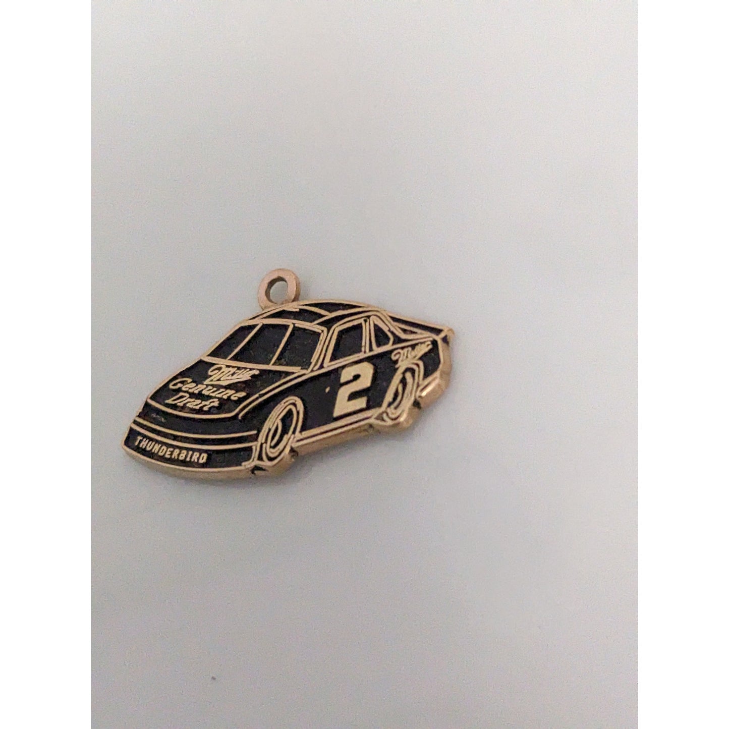 Estate 14k Yellow Gold with Black Enamel Nascar Thunderbird Pendant
