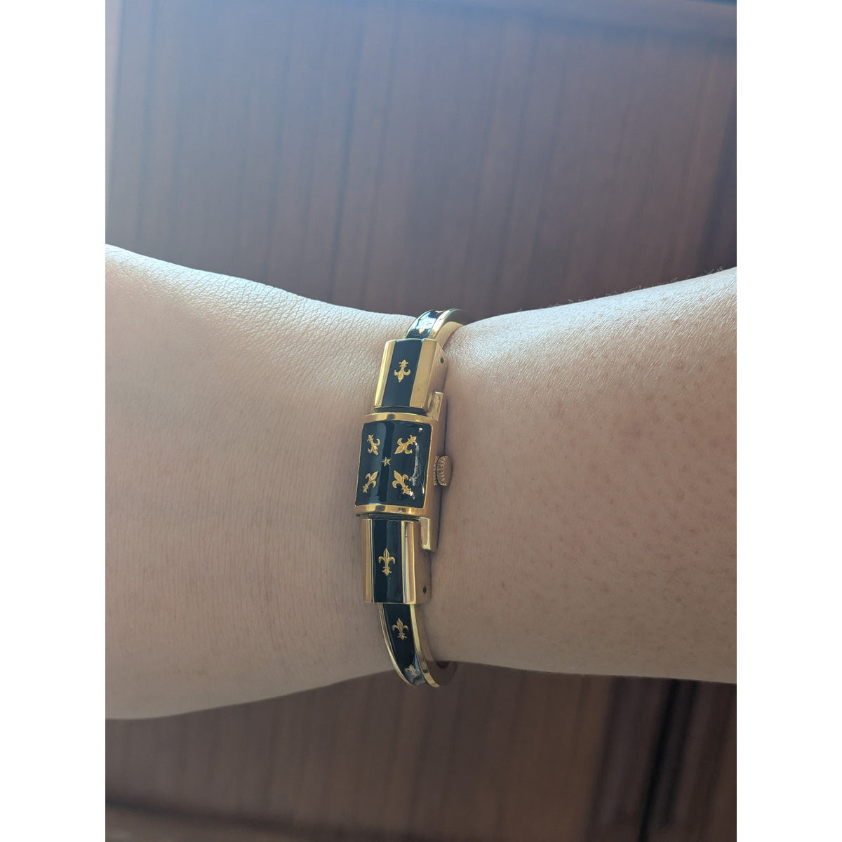 Vintage Chandler Gold Tone Peekaboo Watch Black Enamel Gold Fluer De Lis Accents