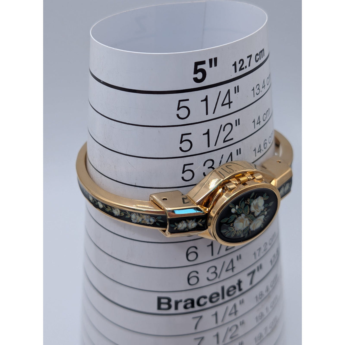 Preowned Andre Mouche 2000s Gold Tone Peekaboo Watch Black Enamel White Flowers
