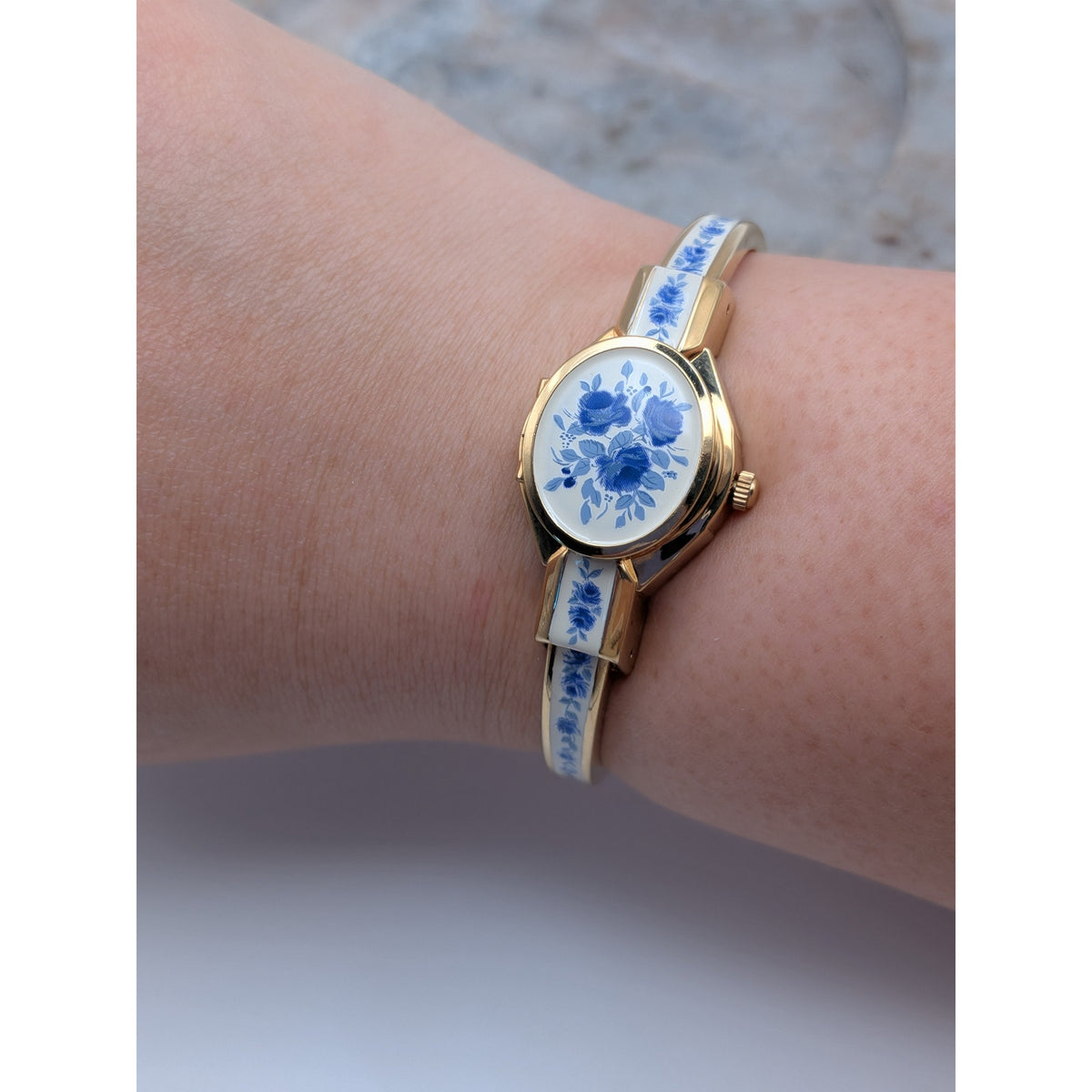 Preowned Andre Mouche Gold Tone Peekaboo Watch White Enamel Blue Flowers