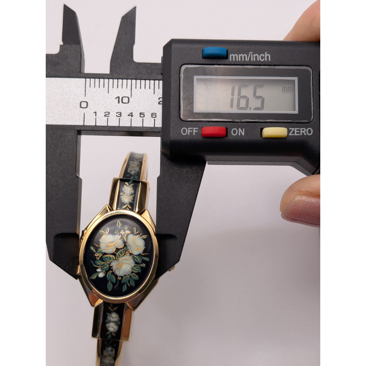 Preowned Andre Mouche 2000s Gold Tone Peekaboo Watch Black Enamel White Flowers