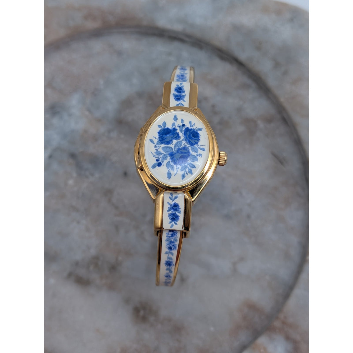 Andre Mouche Gold Tone Bangle Peekaboo Watch White Enamel Deep Blue Flowers