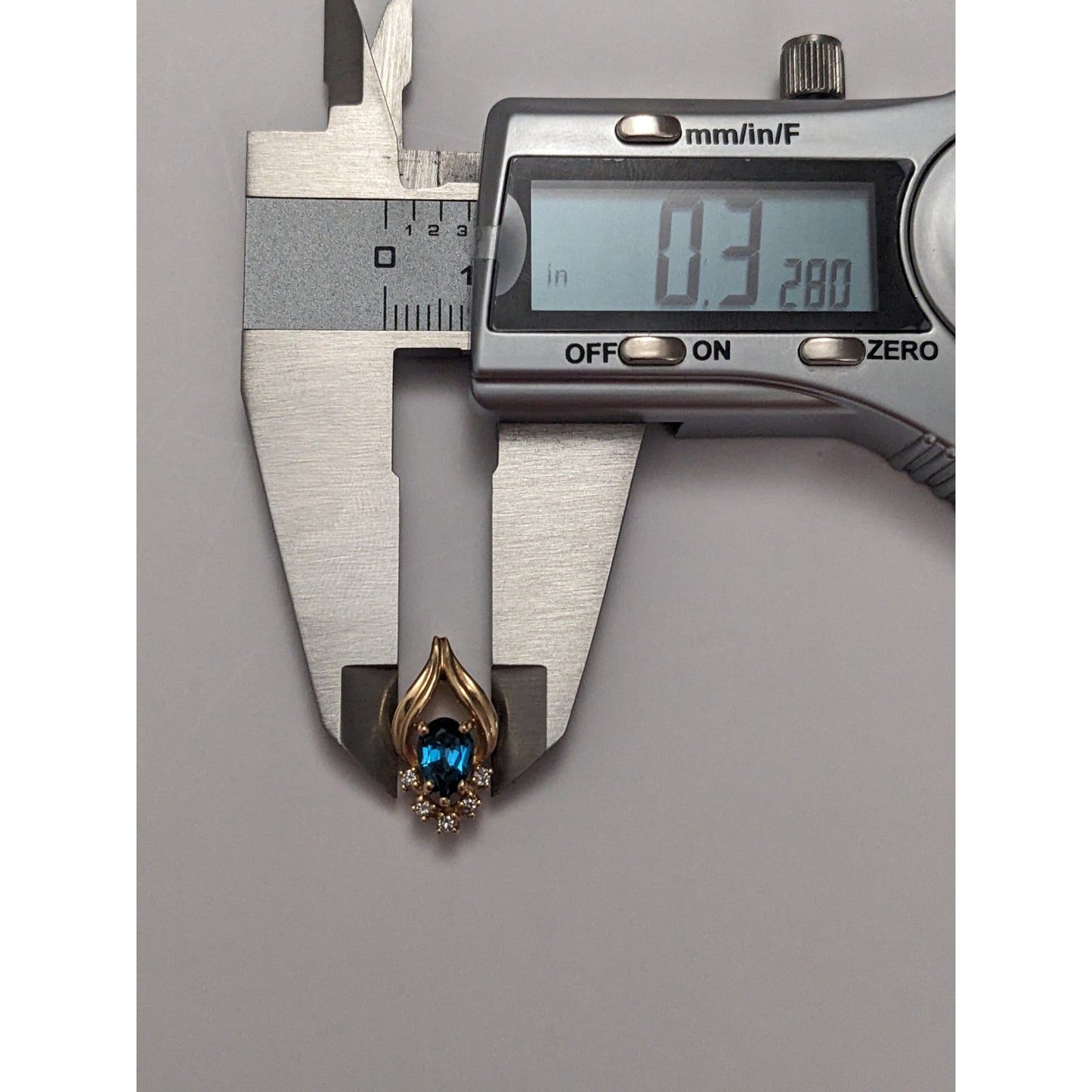 Vintage Unmarked 14k Yellow Gold Blue Topaz Diamond Accent Pendant