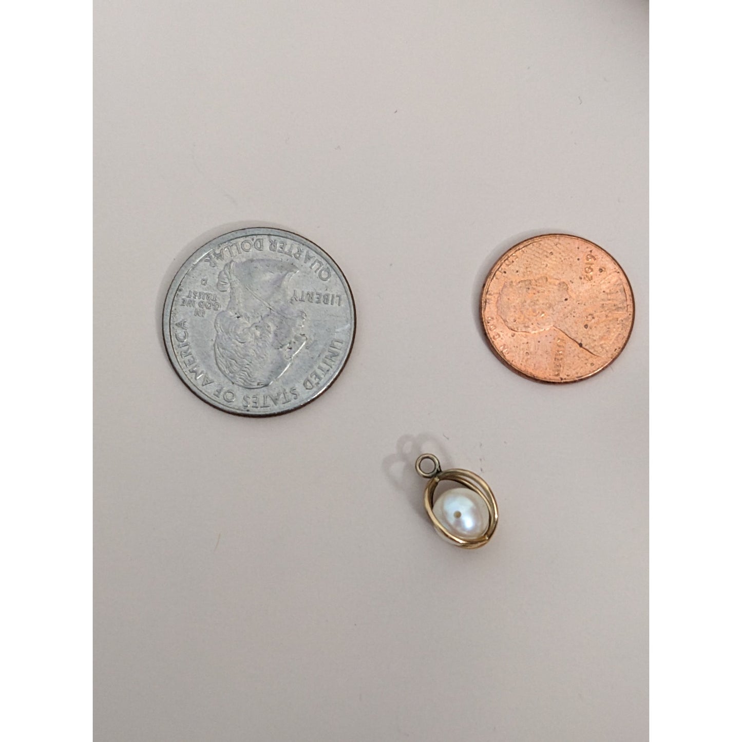 Vintage Unmarked 14k Yellow Gold Circular Case with Pearl Inside Charm Pendant