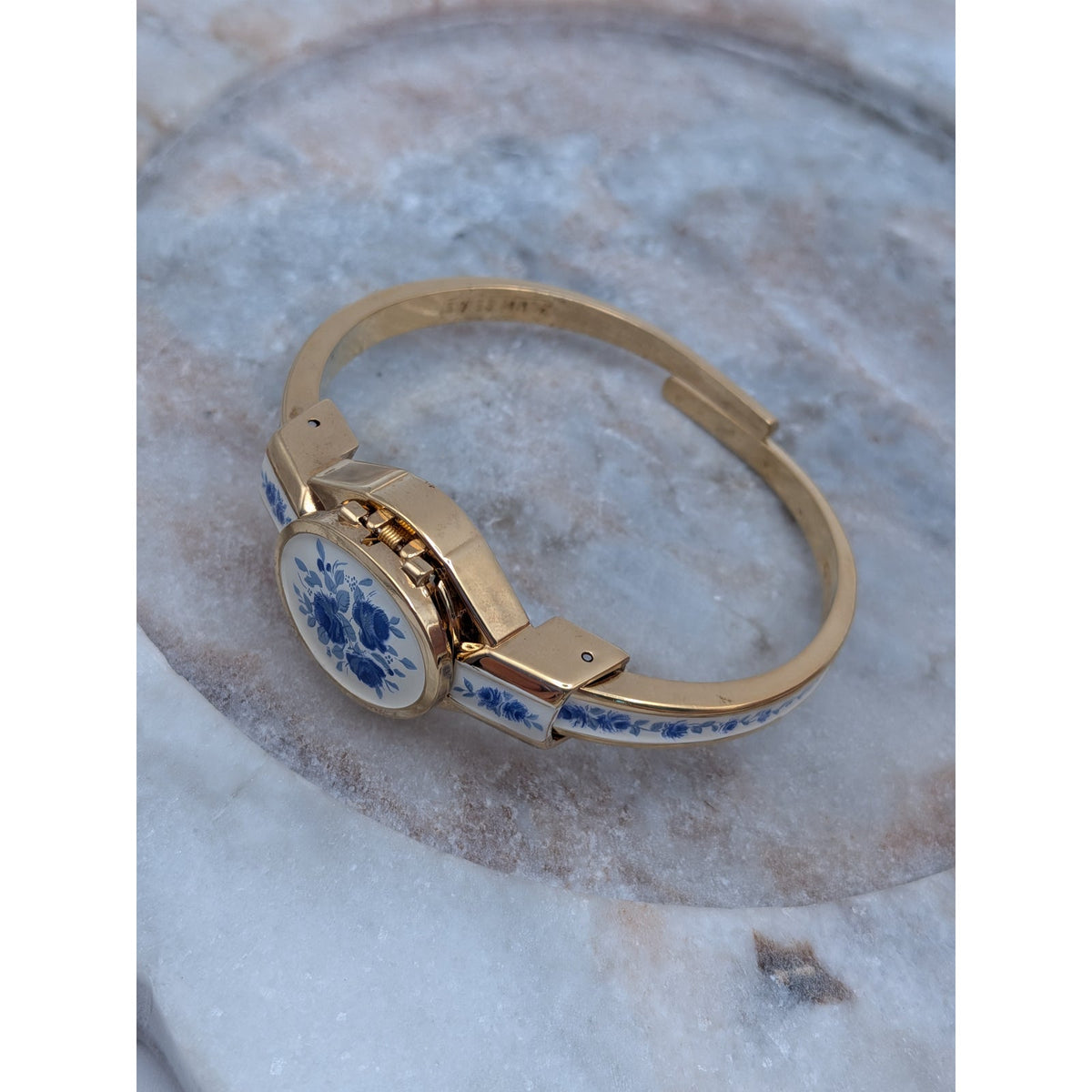 Preowned Andre Mouche Gold Tone Peekaboo Watch White Enamel Blue Flowers