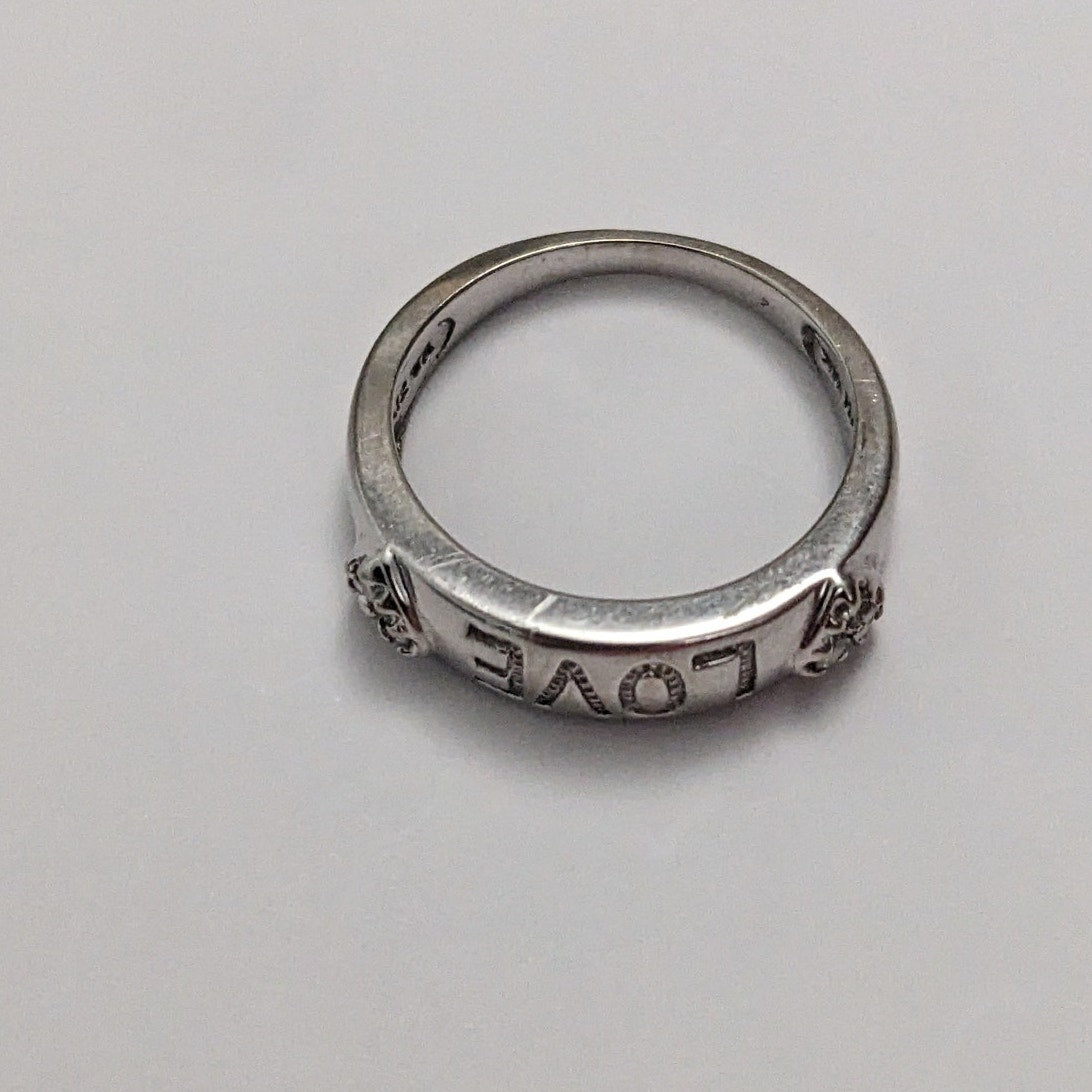 Preowned 10k White Gold "LOVE" Hearts Ring with 0.12ct Diamonds Size 6.75