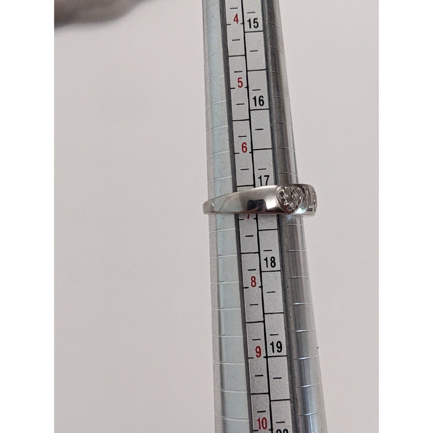 Preowned 10k White Gold "LOVE" Hearts Ring with 0.12ct Diamonds Size 6.75