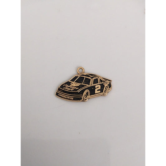 Estate 14k Yellow Gold with Black Enamel Nascar Thunderbird Pendant