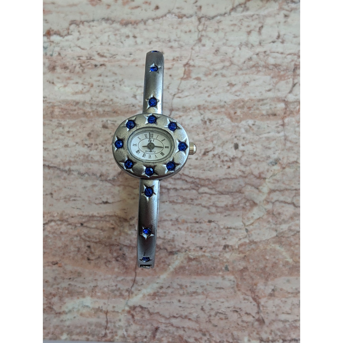 Preowned eee.space Star Watch Silver Tone with Blue Accent Stones