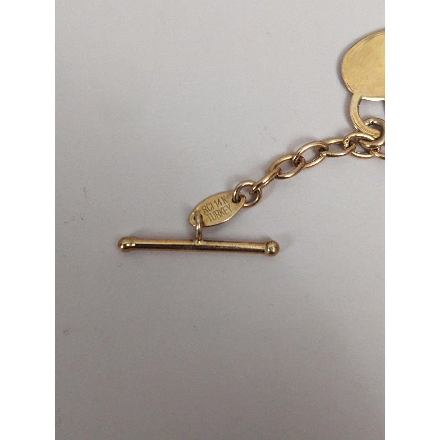 Vintage 14k Yellow Gold Oval Chain Link Toggle Bracelet with Heart Charm 7.25in