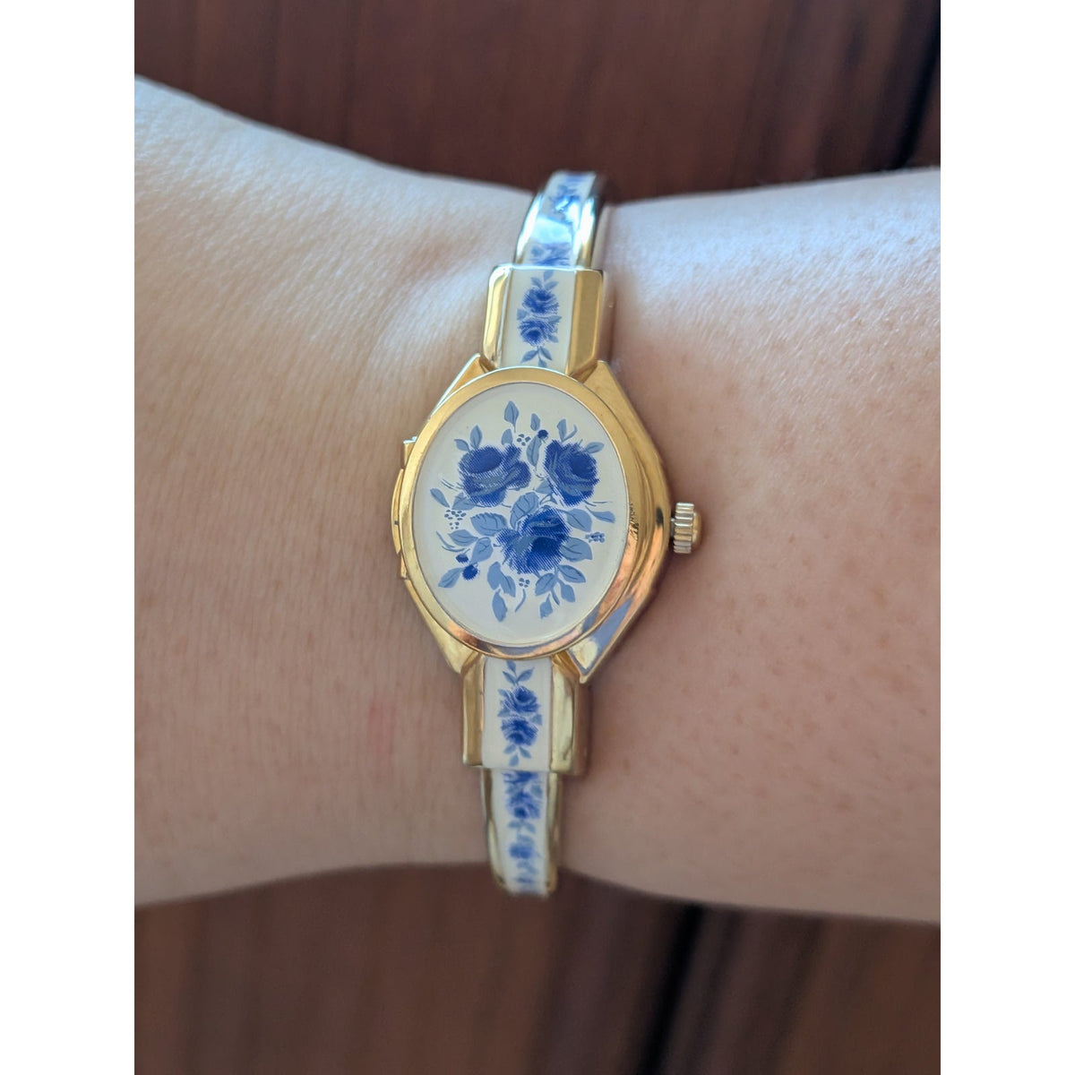 Preowned Andre Mouche Gold Tone Peekaboo Watch White Enamel Blue Flowers