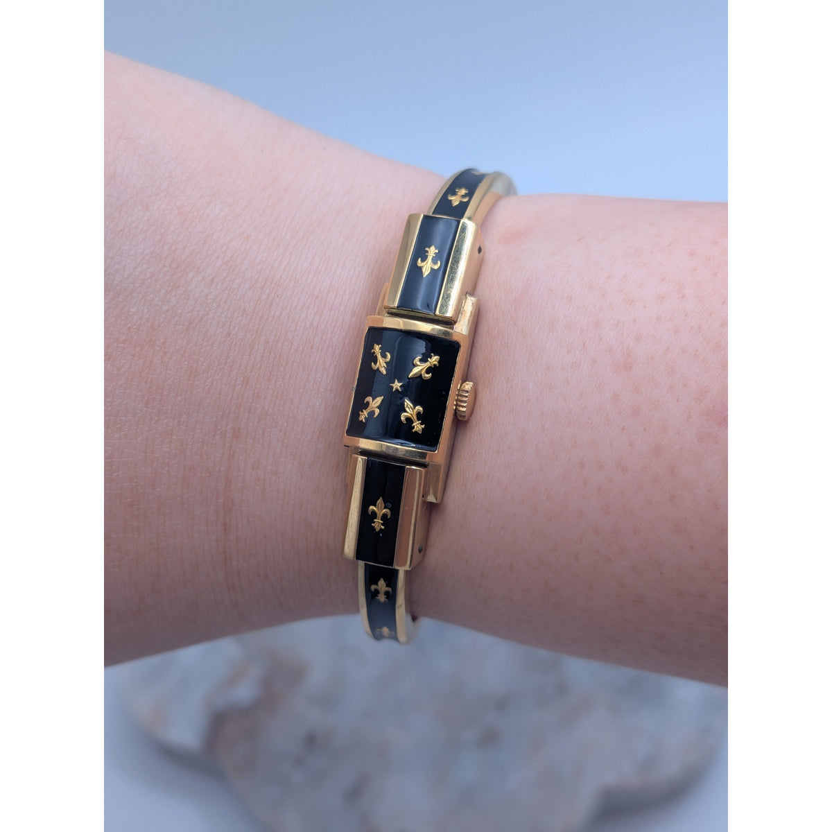 Vintage Chandler Gold Tone Peekaboo Watch Black Enamel Gold Fluer De Lis Accents
