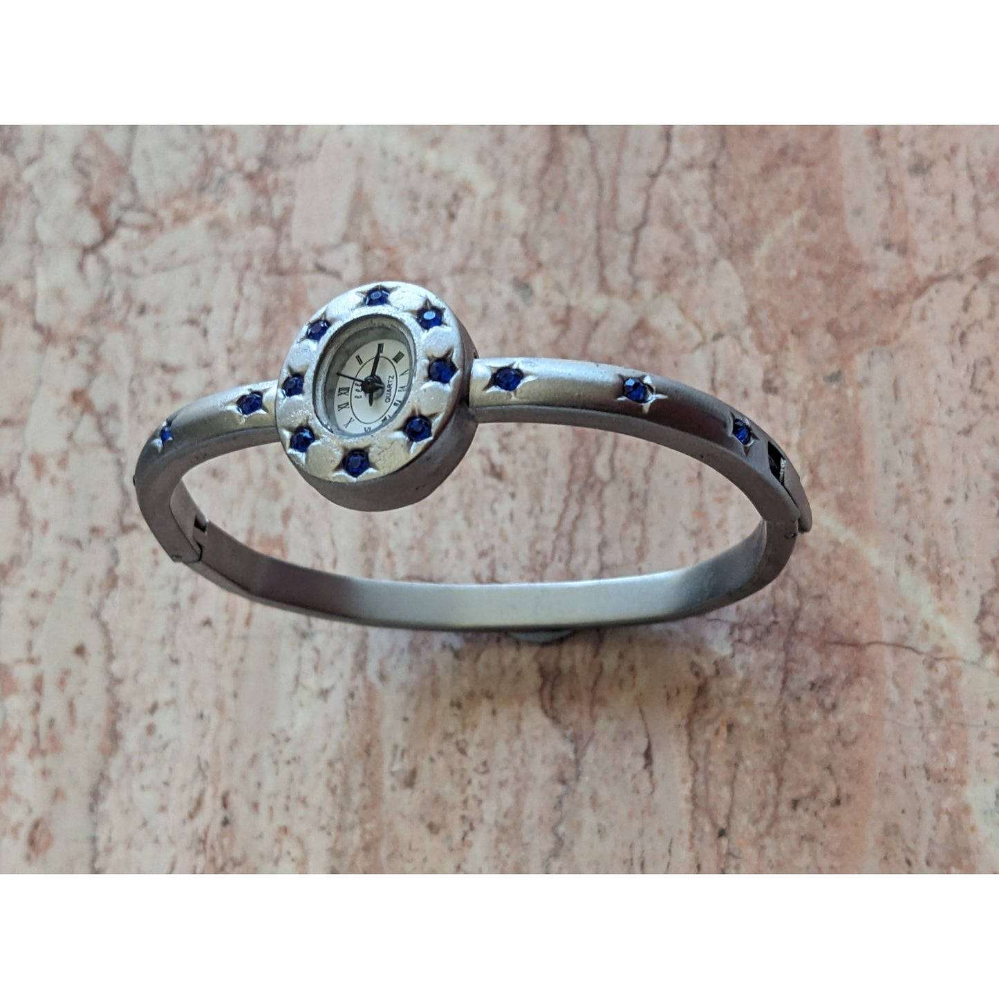 Preowned eee.space Star Watch Silver Tone with Blue Accent Stones