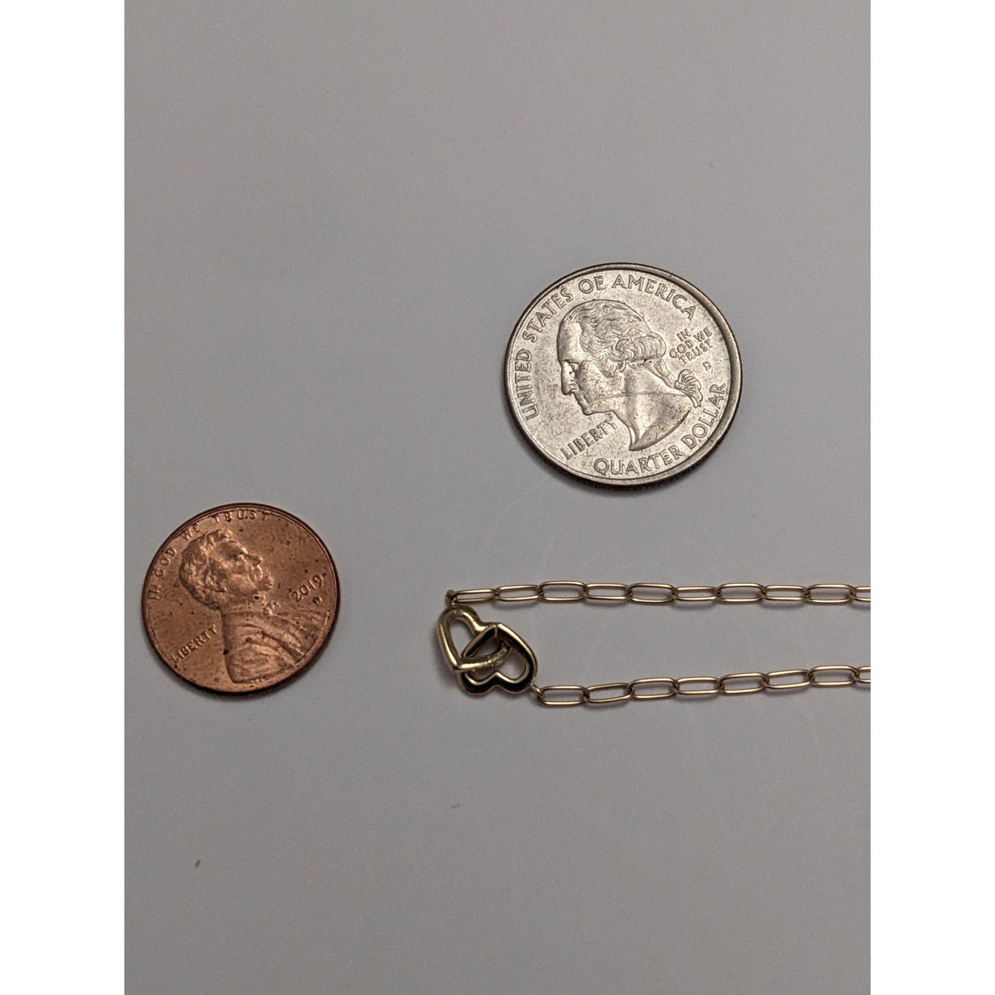 Preowned 14k Yellow Gold Paper Clip Necklace with Interlocking Hearts 17.5in