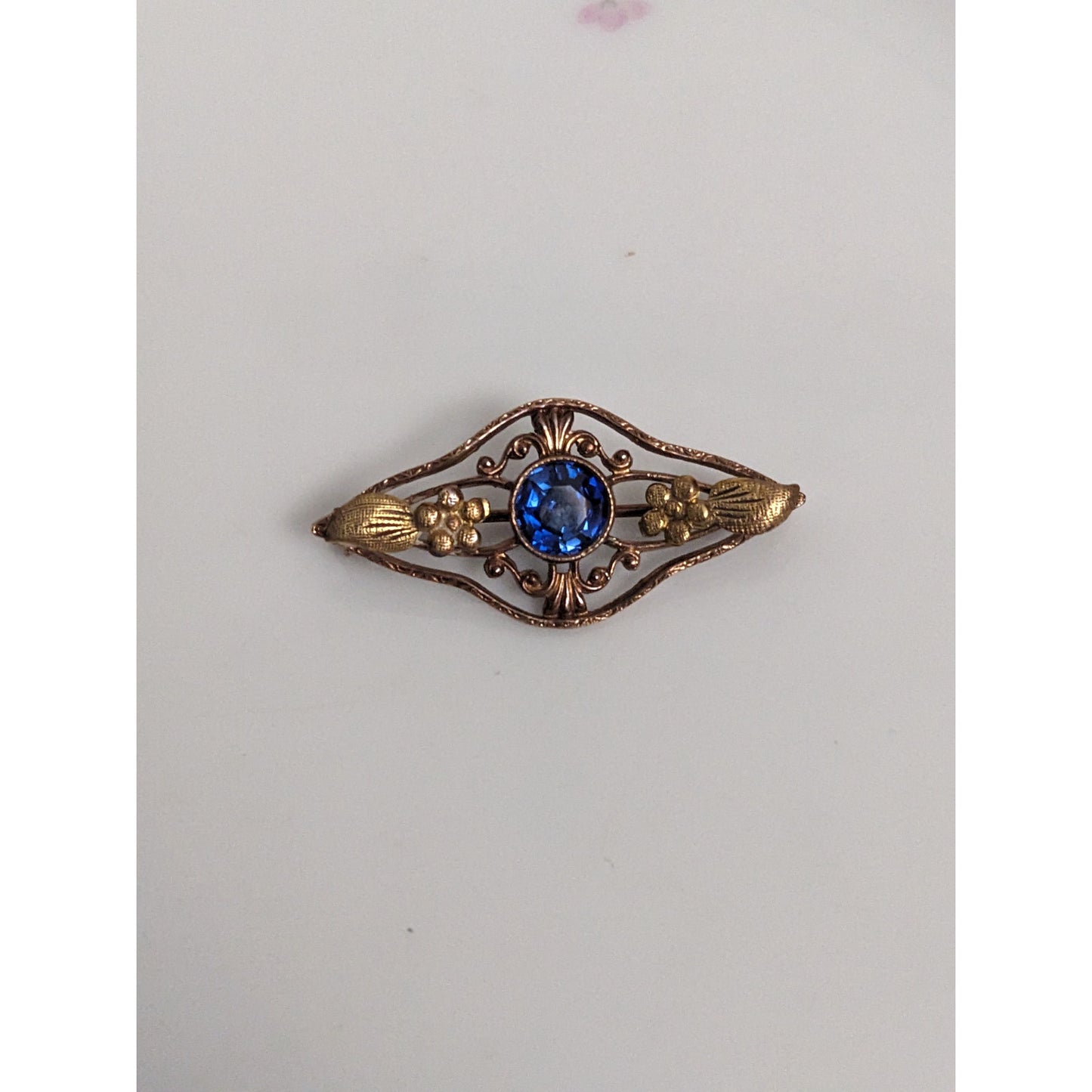 Antique 10k Rose and Yellow Gold Floral Brooch with Blue Gem