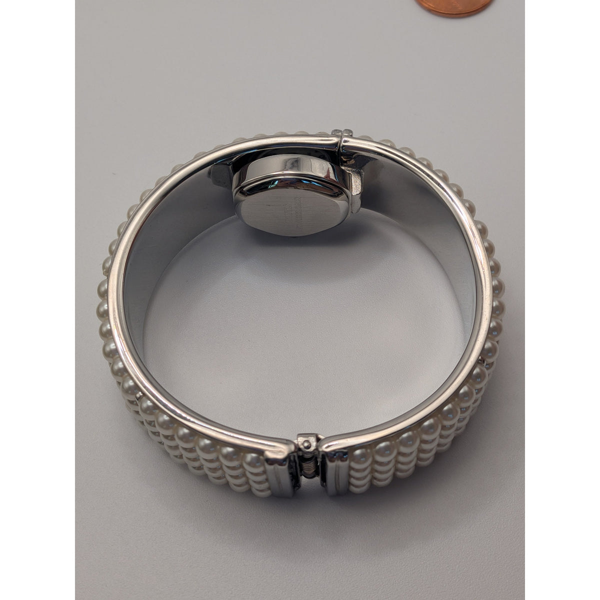 Preowned Winks Silver Tone Faux Pearl Peekaboo Bangle Watch
