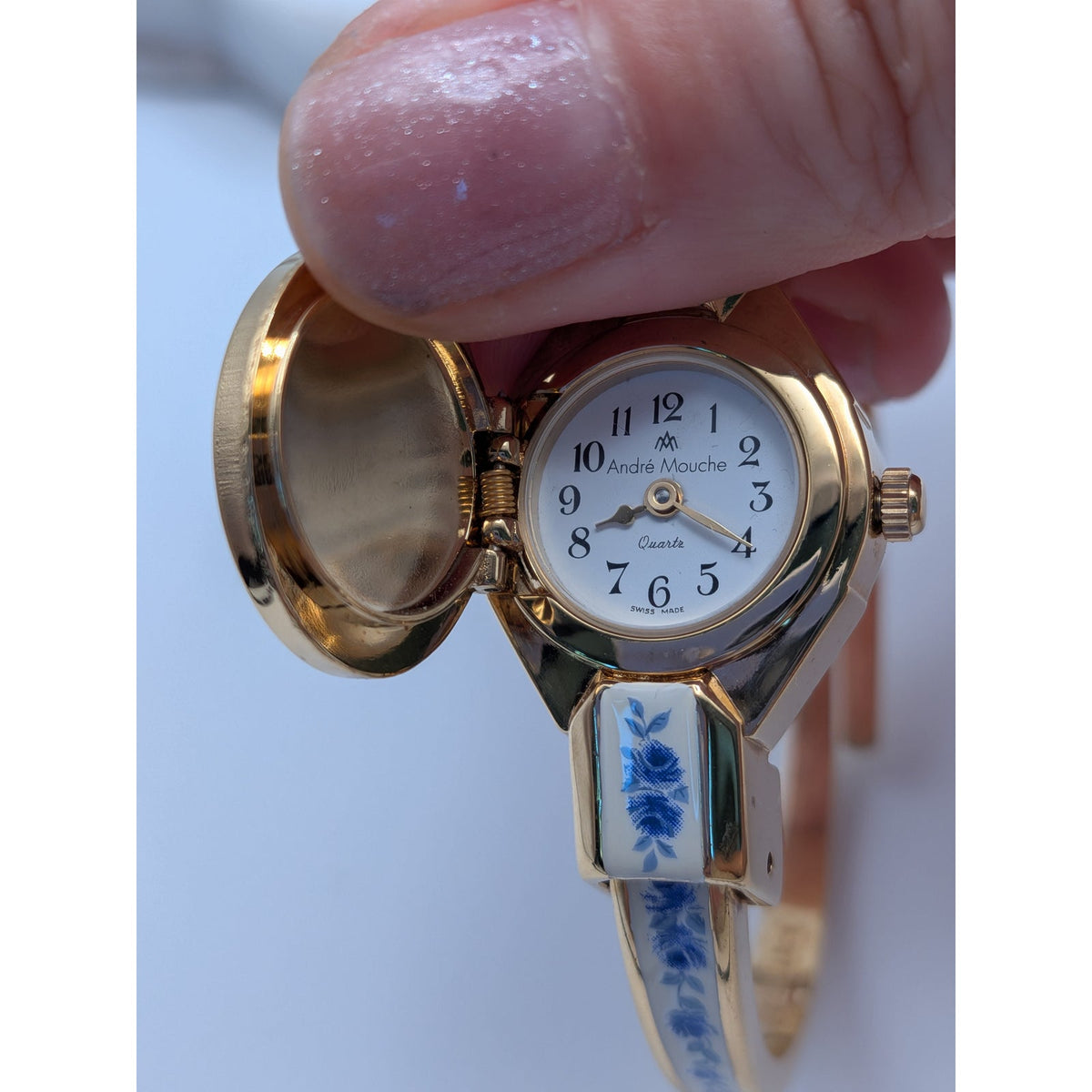 Preowned Andre Mouche Gold Tone Peekaboo Watch White Enamel Blue Flowers
