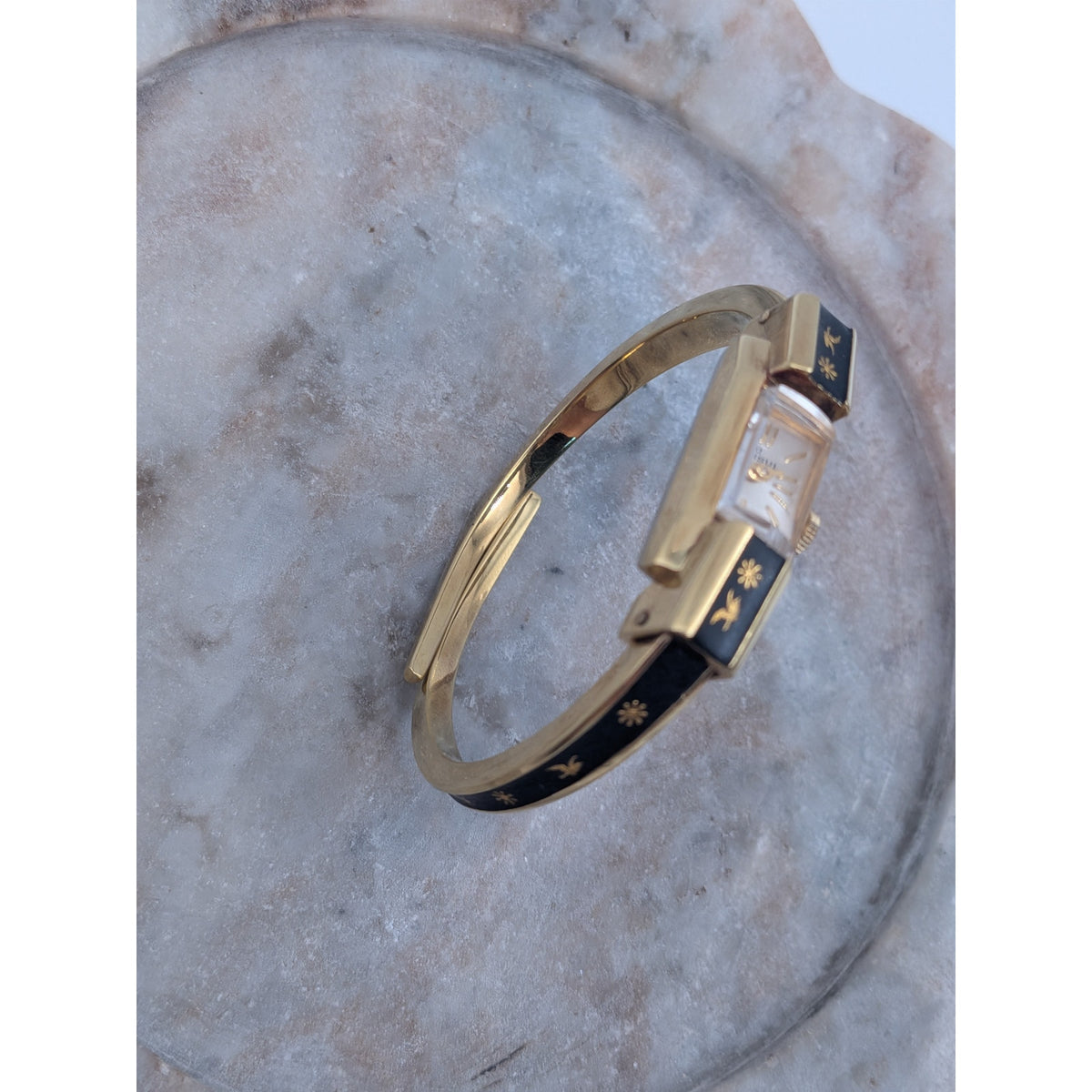 Vintage Consul Gold Tone Watch Matte Black Enamel Bird and Flower Accents