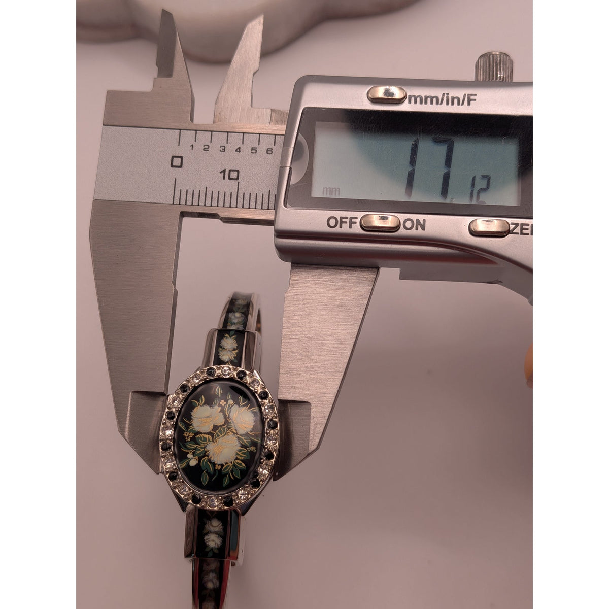Andre Mouche Silver Tone Bangle Peekaboo Watch Black Enamel White Roses & Stones