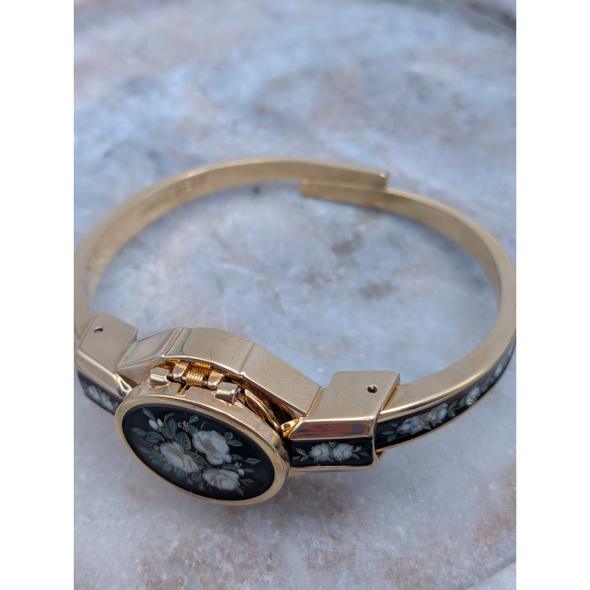 Preowned Andre Mouche 2000s Gold Tone Peekaboo Watch Black Enamel White Flowers
