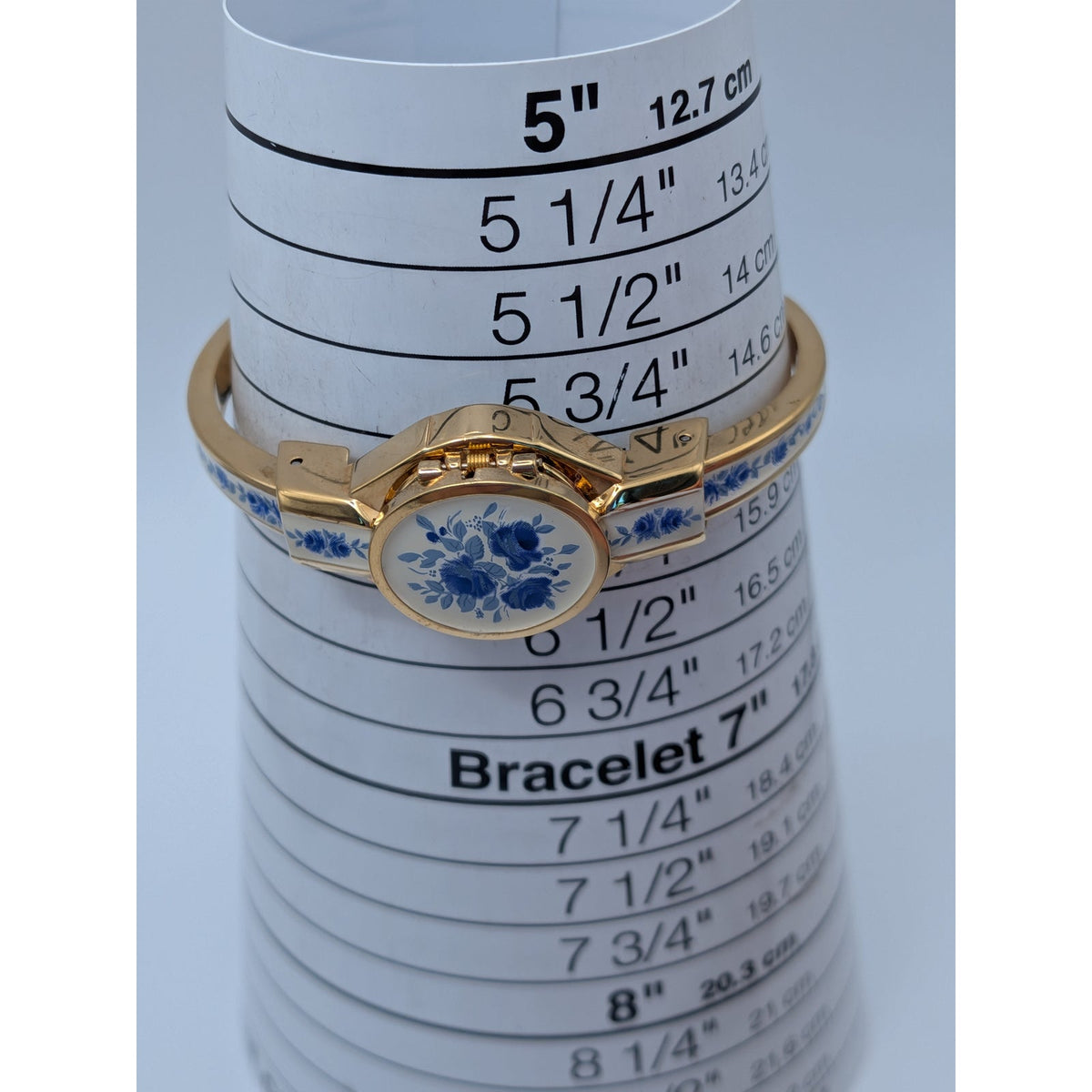 Preowned Andre Mouche Gold Tone Peekaboo Watch White Enamel Blue Flowers