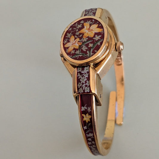 Andre Mouche Gold Tone Metal Bangle Concealed Watch Deep Red Enamel and Flowers