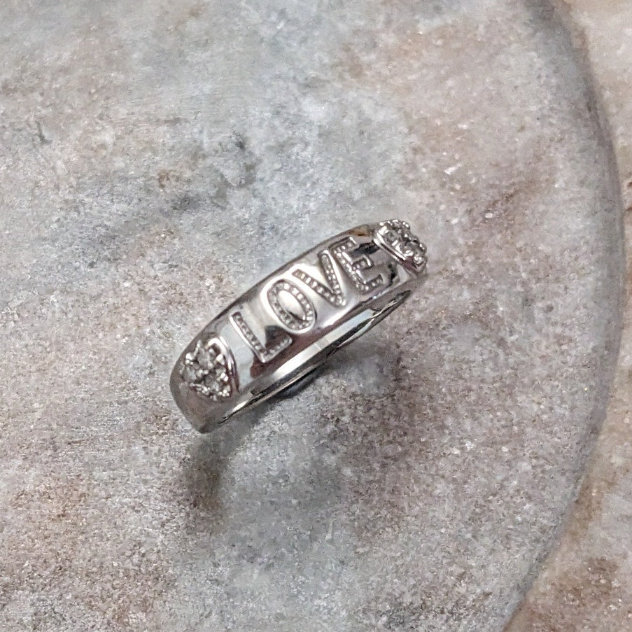 Preowned 10k White Gold "LOVE" Hearts Ring with 0.12ct Diamonds Size 6.75