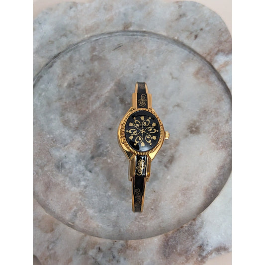 Vintage Andre Mouche Gold Tone Peekaboo Watch Black Enamel Gold Floral Accents